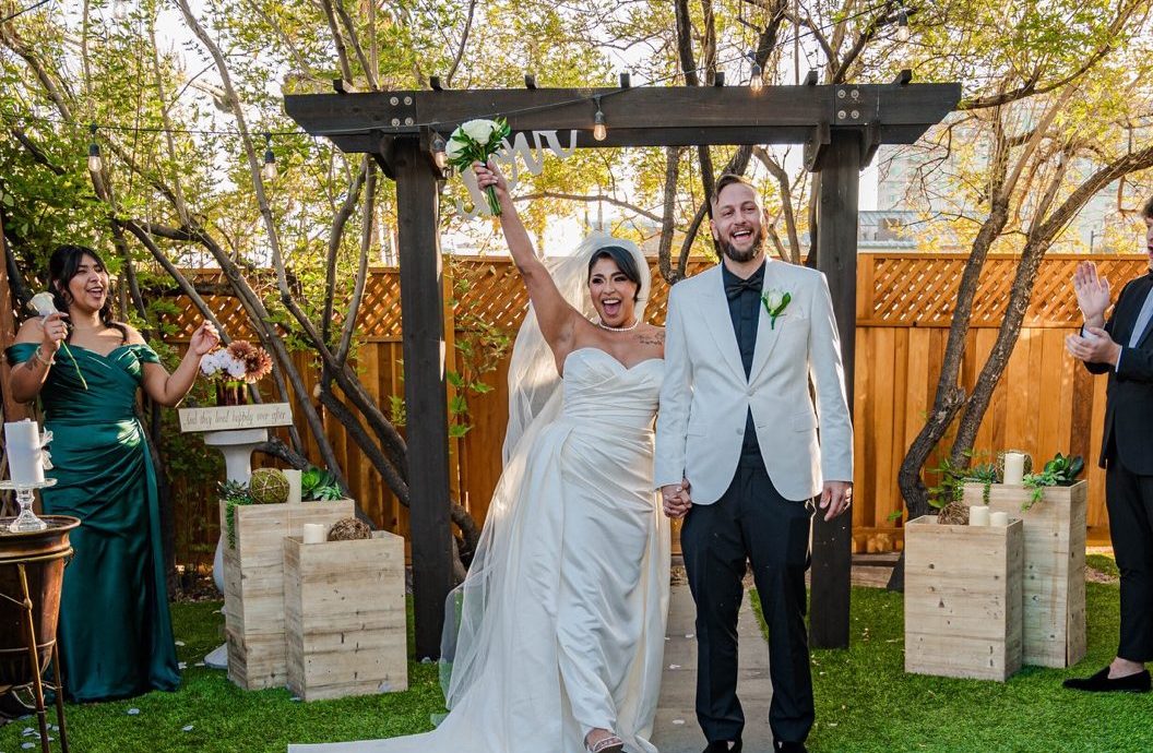 Bride and groom exchanging vows under the gazebo at Mon Bel Ami Wedding Chapel in Las Vegas