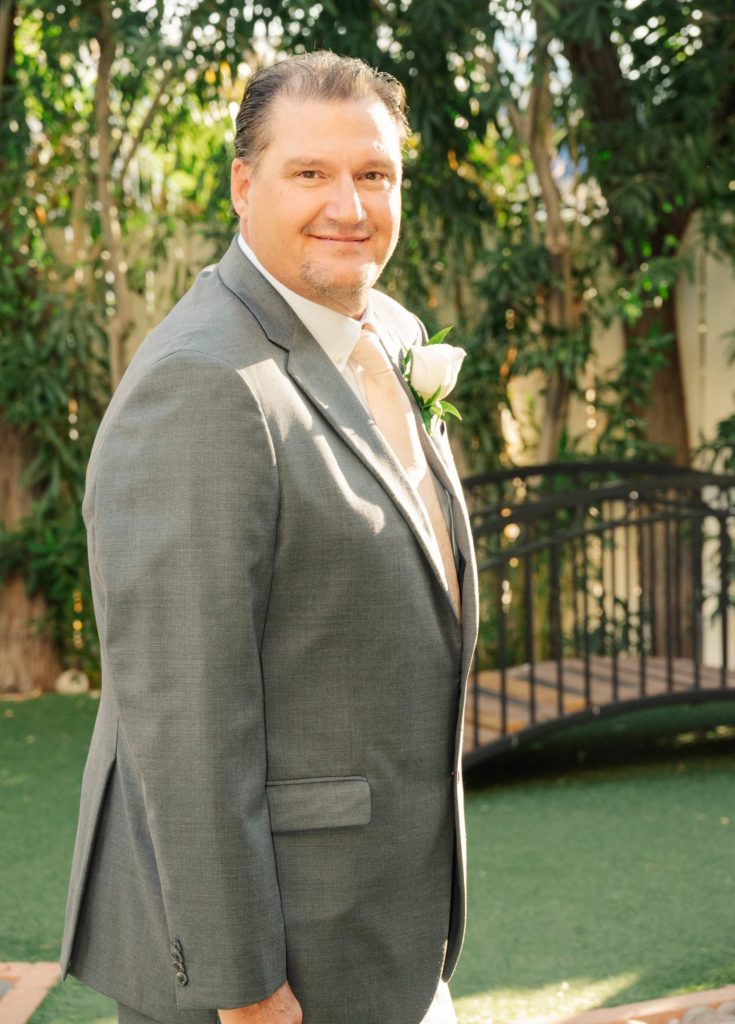 Groom in rented tuxedo at Las Vegas wedding chapel