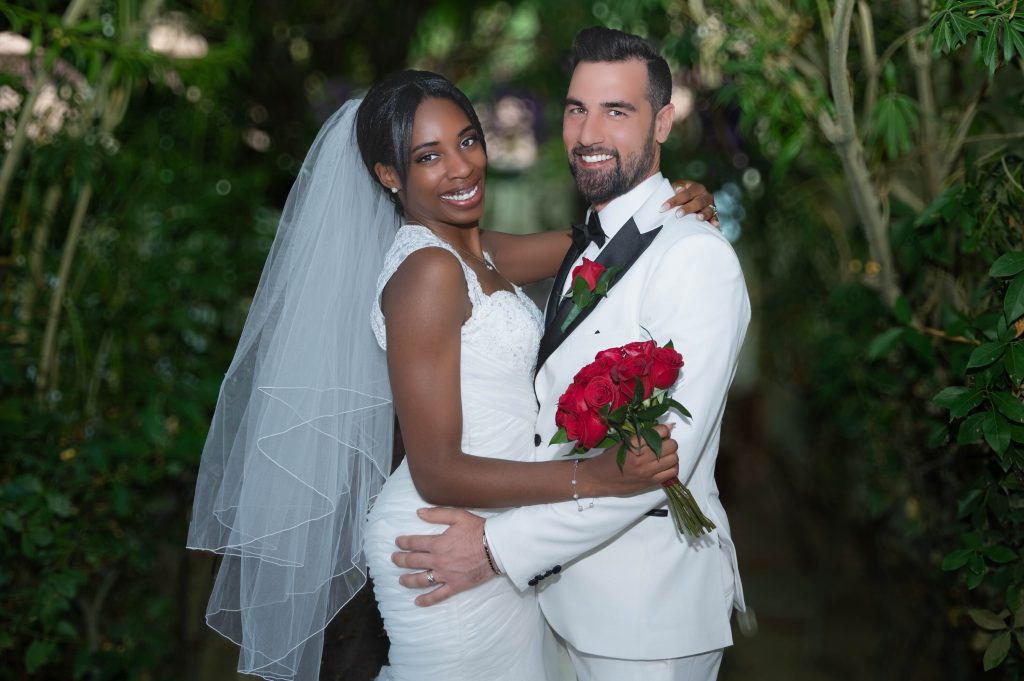 Bride and groom in rented wedding gown and tuxedo Las Vegas
