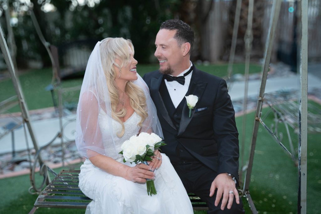 Bride and groom in affordable wedding gown and tux rental Las Vegas