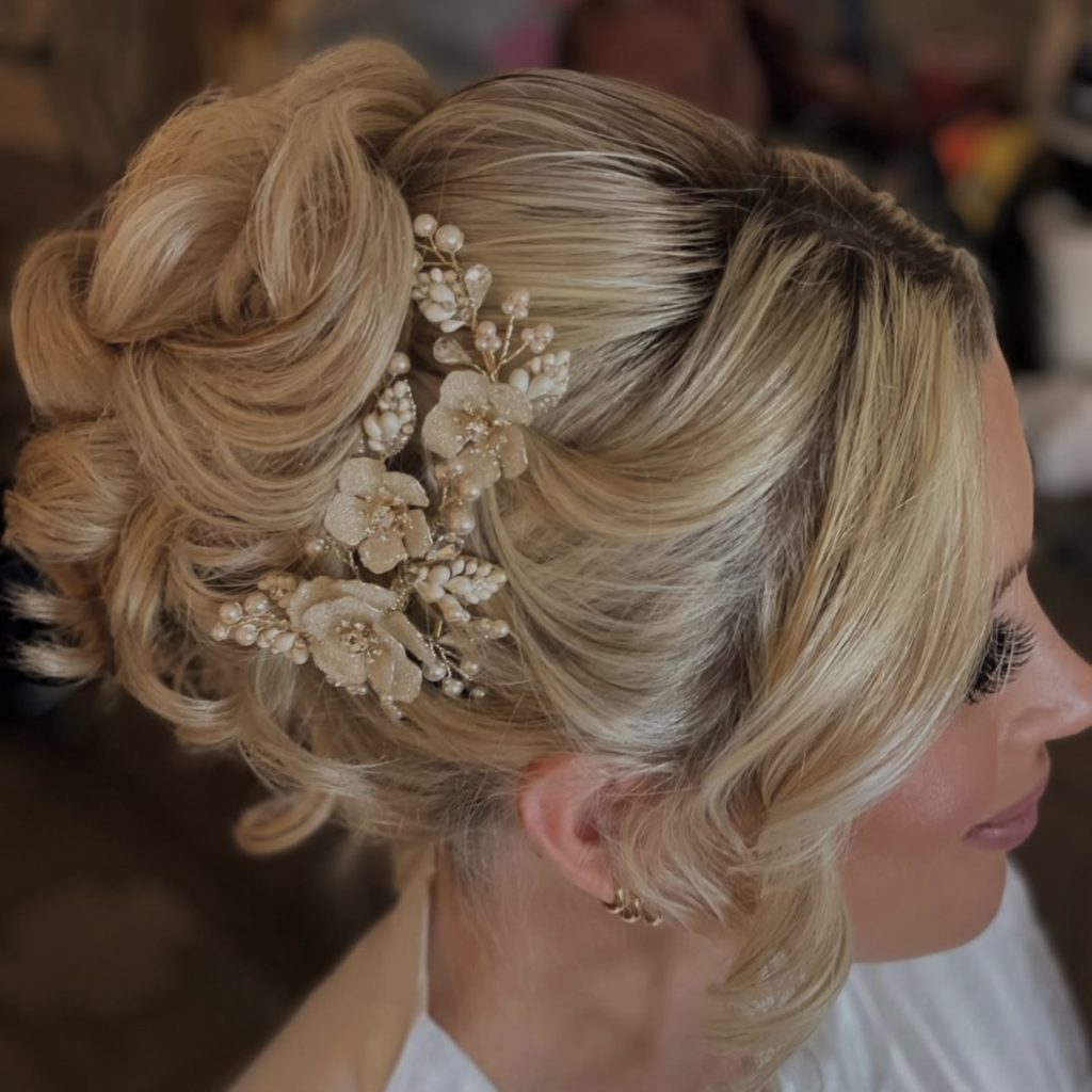 Bride getting elegant hair and makeup done at a Las Vegas wedding salon