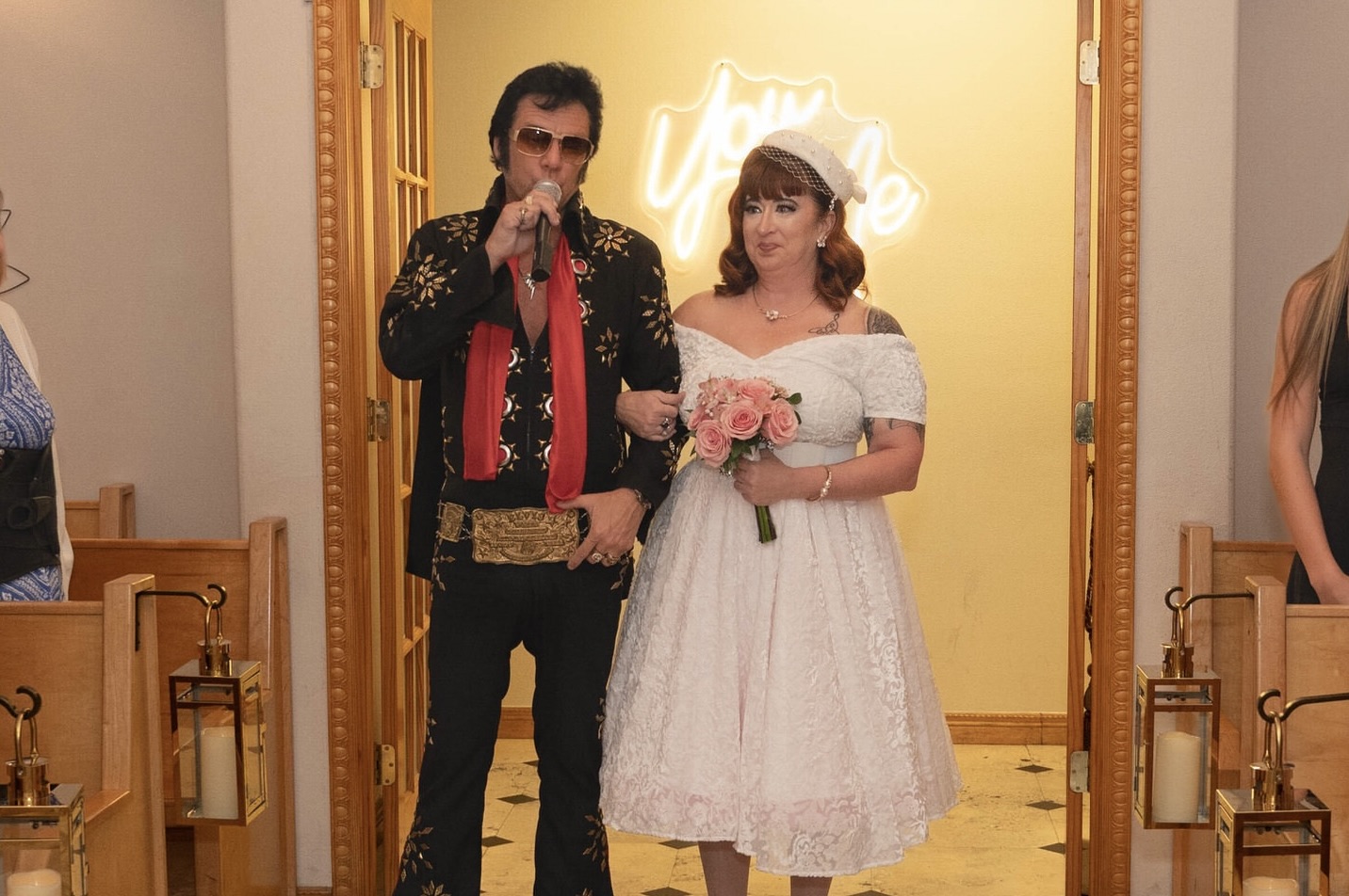 Elvis sings as he walks a bride up the aisle in a Las Vegas wedding chapel