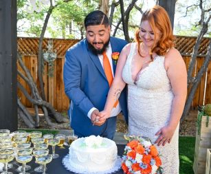 Bride and Groom cutting Las Vegas Wedding Cake at reception